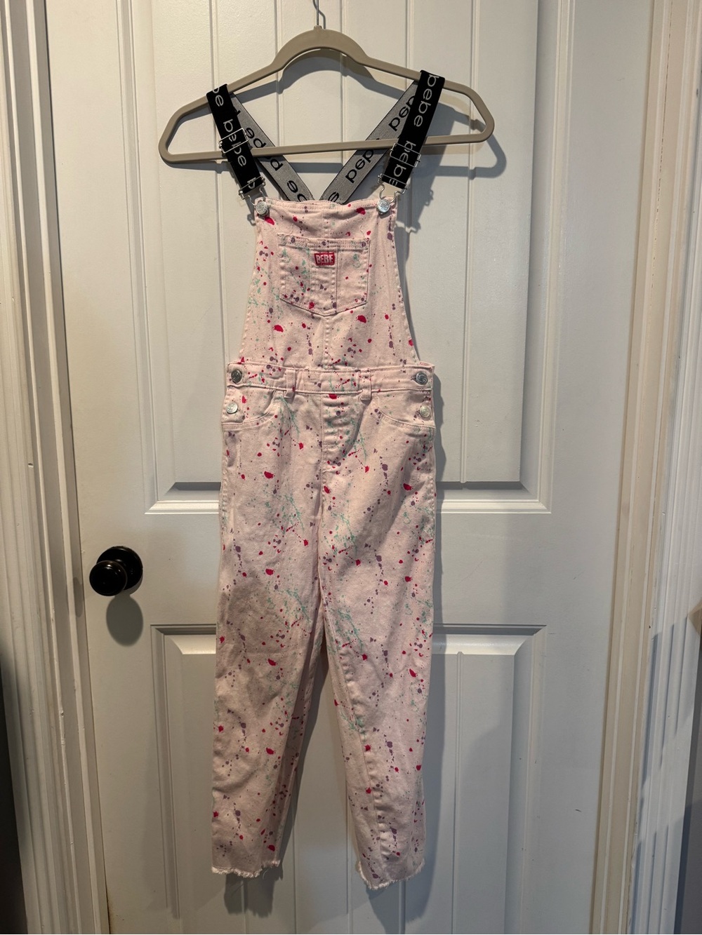 bebe Pink Paint-Splatter Denim Overalls with Black Logo Straps